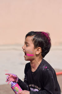 Boy playing during holi