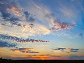 Low angle view of dramatic sky during sunset