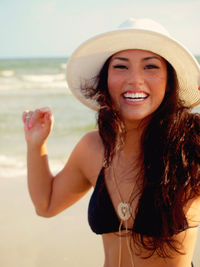 Portrait of beautiful woman in bikini on beach