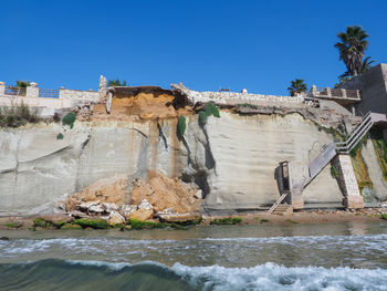 Panoramic shot of building against clear blue sky