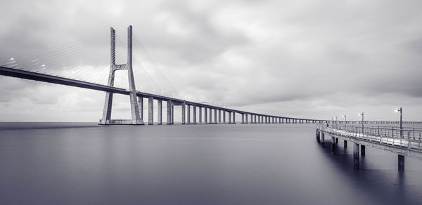 Vasco da gama bridge in lisbon by sunrise, portugal