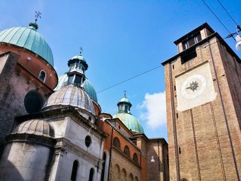 Low angle view of church against blue sky