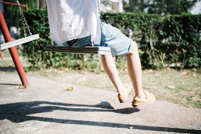 Woman standing on grass