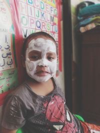 Portrait of boy wearing mask