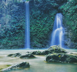 View of waterfall in forest