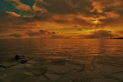 Scenic view of sea against sky during sunset