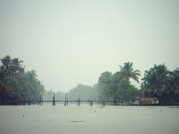 Scenic view of beach against clear sky