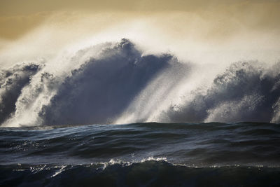 Waves splashing on rocks