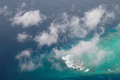 High angle view of sea above clouds