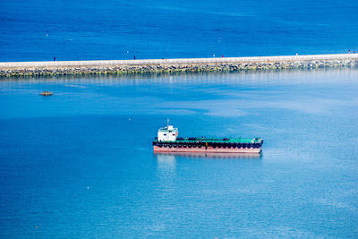 Boat sailing in sea