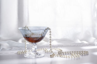 Close-up of wine glass on table