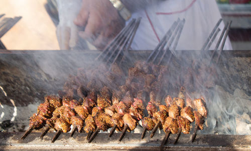 Close-up of meat on barbecue grill