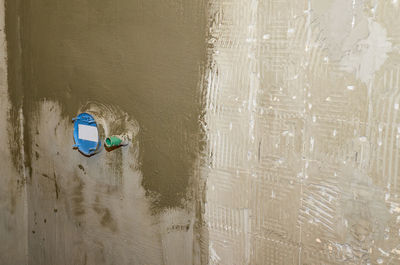 High angle view of abandoned wall on beach