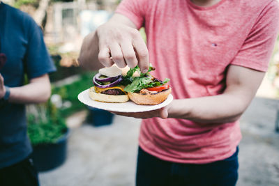 Close-up of hand holding food