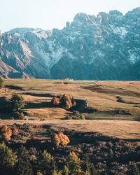 Scenic view of landscape and mountains against sky