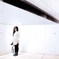 Full length of woman standing on ground