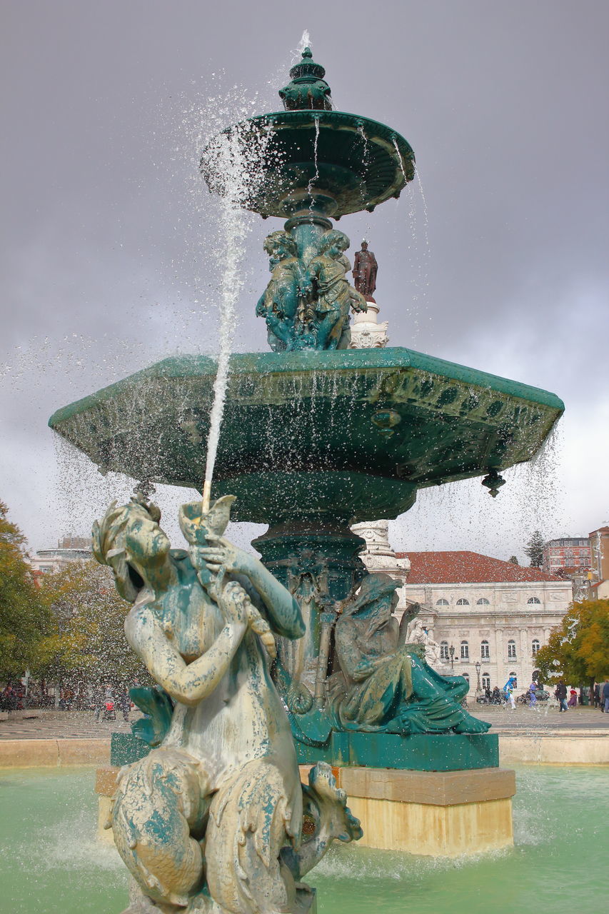 STATUE IN FOUNTAIN