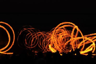 Light painting against sky at night