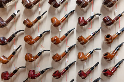 Full frame shot of smoking pipe for sale at store