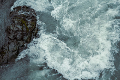 Swirling hvira river with rock landscape photo