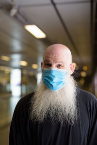 Portrait of man wearing mask