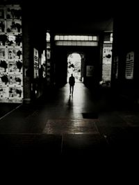 People walking in tunnel