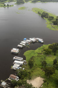 Beautiful aerial view to green flooded rainforest and floating houses