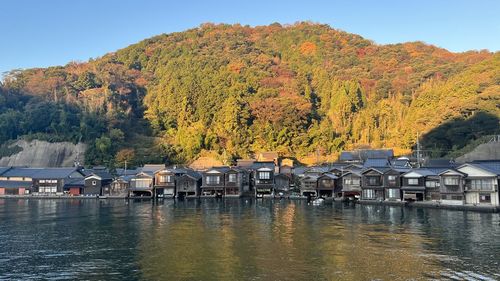 Scenic view of lake in forest during autumn