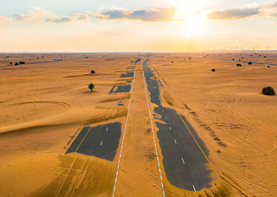 Panoramic view of road against sky during sunset