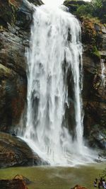 View of waterfall in forest