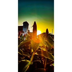 Digital composite image of buildings against sky