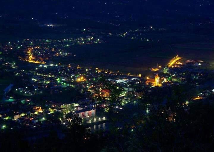 night, illuminated, cityscape, city, building exterior, architecture, built structure, aerial view, crowded, high angle view, residential district, residential building, city life, sky, skyscraper, residential structure, no people, outdoors, light - natural phenomenon, glowing