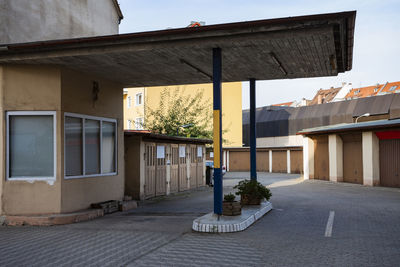 Street amidst buildings against sky