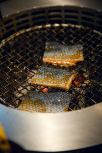 Close-up of crab on barbecue grill