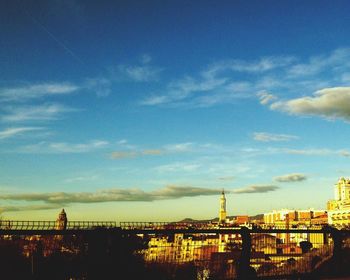 View of city against cloudy sky