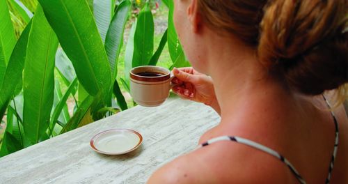 High angle view of woman using mobile phone