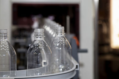 Close-up of glass bottles on table