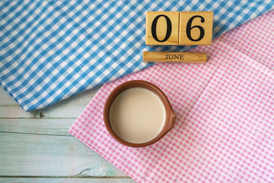 High angle view of coffee cup on table