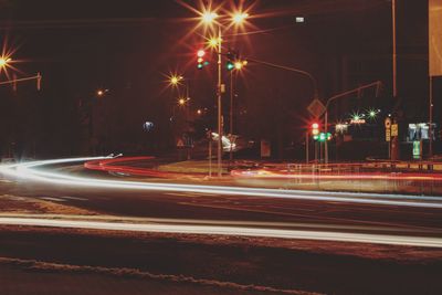 Light trails on city street at night