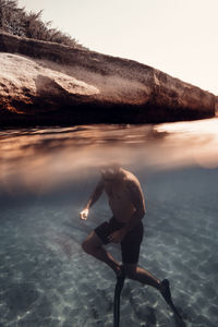 Man taking a breath after a dive 