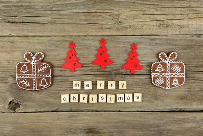 Directly above shot of christmas decorations and cookies on table