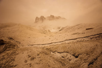 Scenic view of desert against sky