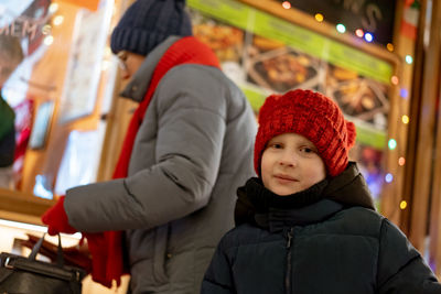 Portrait of smiling boy wearing knit hat