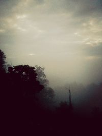Scenic view of landscape against cloudy sky