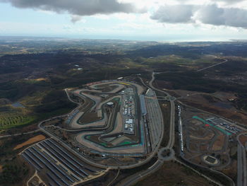 High angle view of road amidst landscape against sky