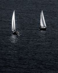 Close-up of sailboat in sea