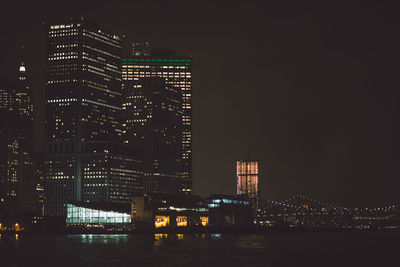 Illuminated city lit up at night