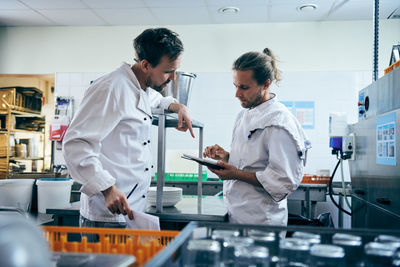 Men working in kitchen