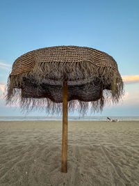 Scenic view of beach against clear sky