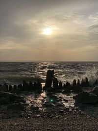 Scenic view of sea against sky during sunset